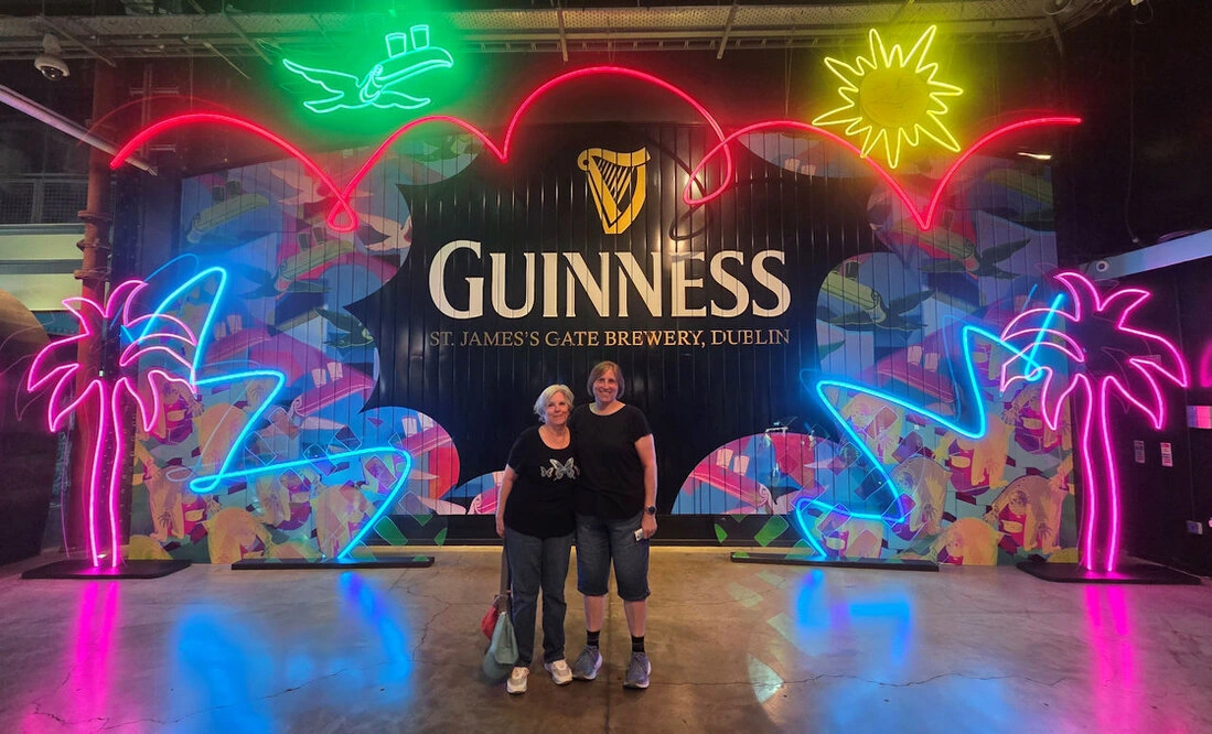 Glasses of Irish whiskey in a warm distillery setting